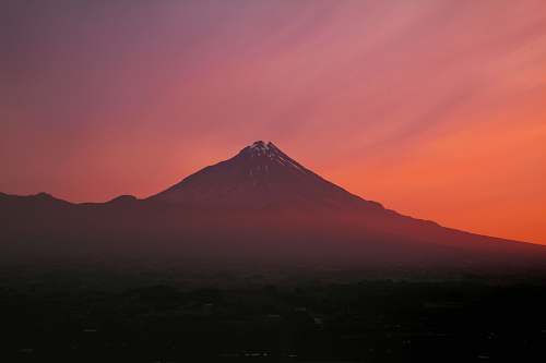 mountain mountain surrounded by clouds paritutu